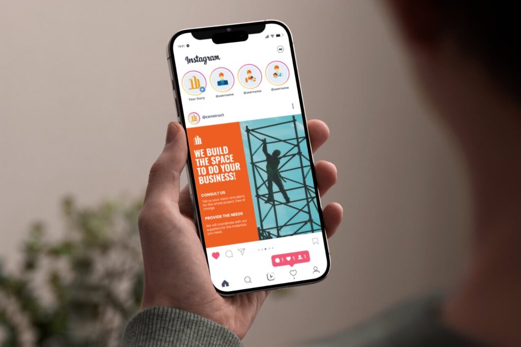 man holding a phone looking at an instagram ad