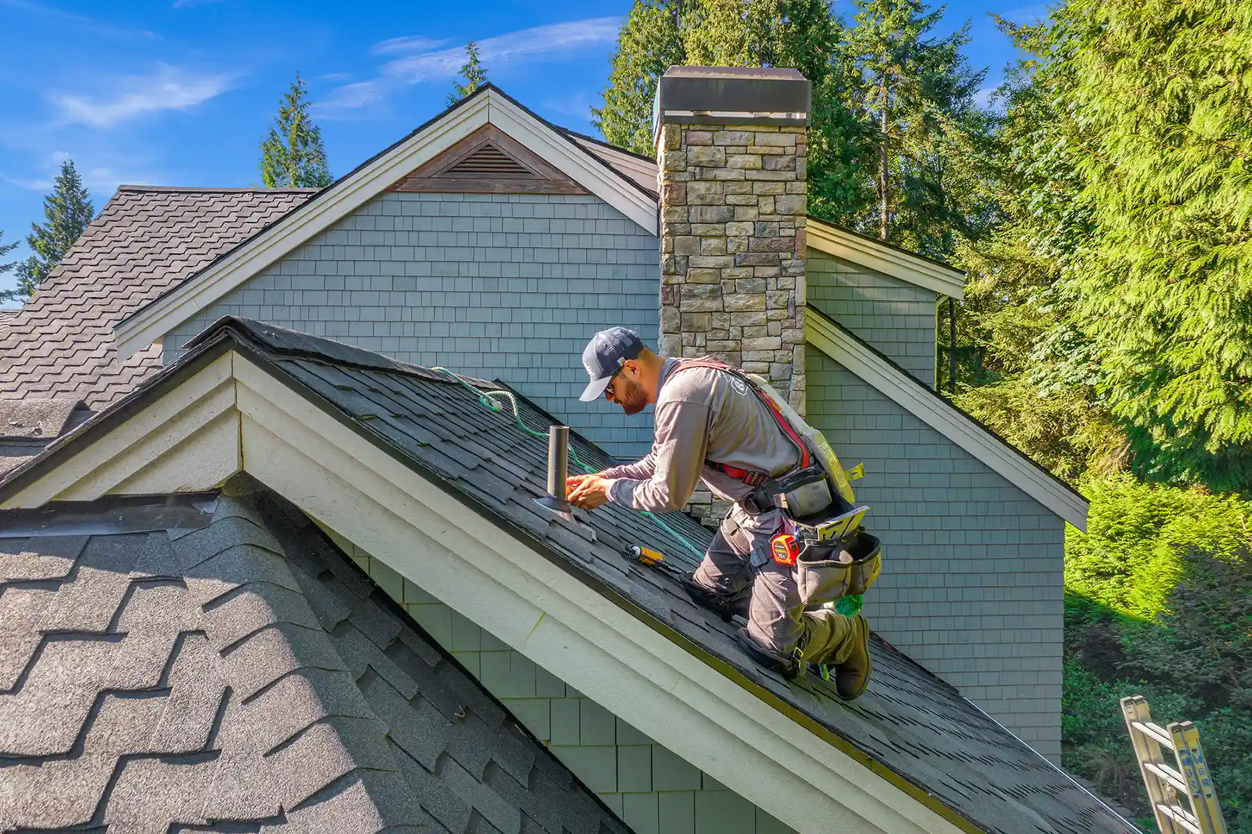 a roofing contractor working on a Bellingham roof